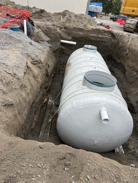 Commercial septic tank in excavated pit
